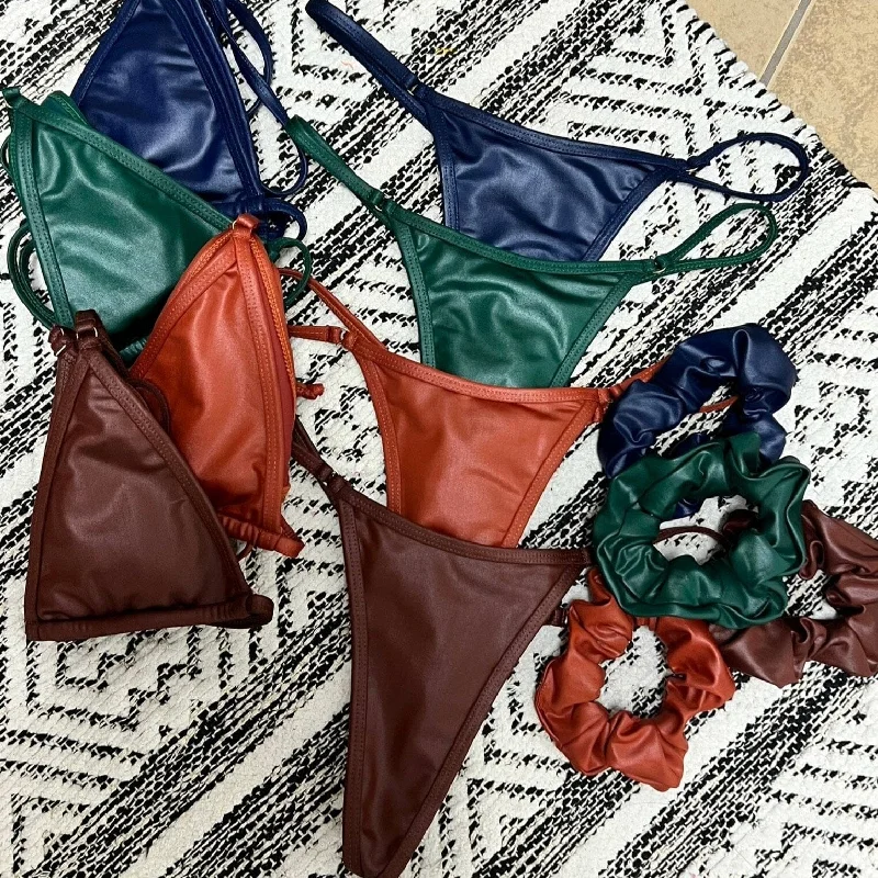 Floral - printed bikini for a feminine and colorful beach vibeBARELY THERE MICRO THONG BOTTOM- LEATHER GREEN Floral - printed bikini for a feminine and colorful beach vibeBARELY THERE MICRO THONG BOTTOM- LEATHER GREEN